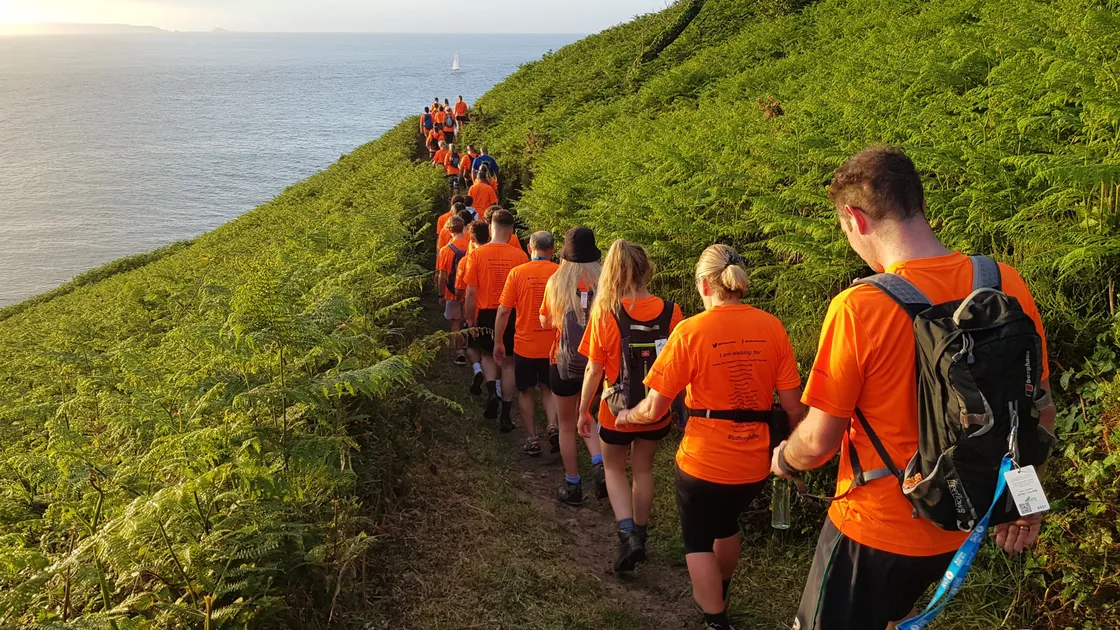 Walkers on the cliff paths during the 2022 Saffery Rotary Walk. Entries are being accepted for next year’s, which is the 25th, and 2023 is also the 100th anniversary of the founding of the Rotary Club of Guernsey.