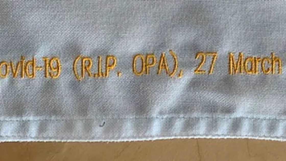 Spike Jinks' flag is embroidered to honour his grandfather or 'Opa' who died from Covid last year and the hardwork of the local Covid team. Image by Chris Jinks.  (29389043)
