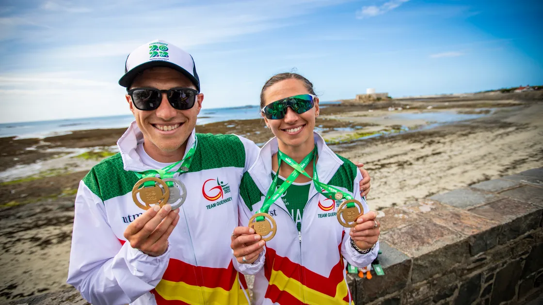 Triathletes Josh Lewis and Megan Chapple show off their gold medals. (Picture by Sophie Rabey, 32293526)
