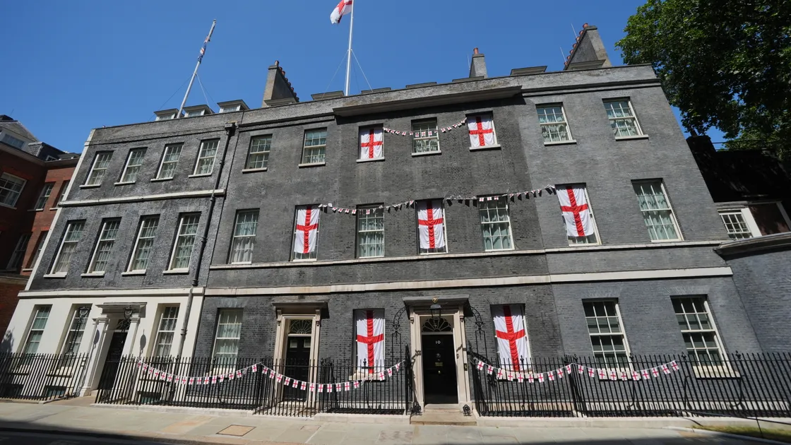 St George’s Cross flags on Number 10, Downing Street, central London, ahead of England playing Argentina in the World Cup semi-final on Wednesday in Atlanta, USA. (Picture: Yui Mok/PA Wire)