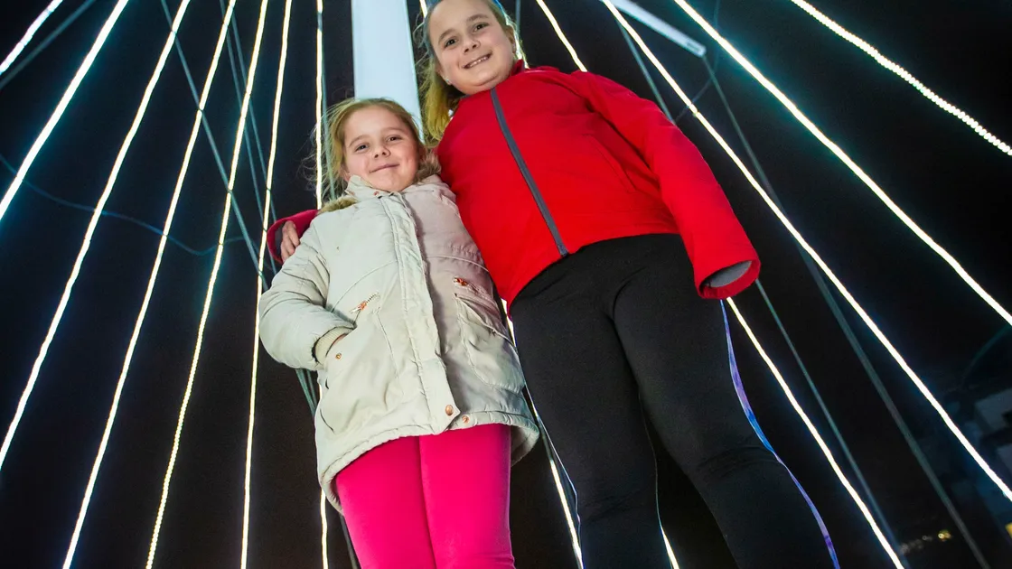 Sisters Emilie, 9 and Amie, 11, Miller, were picked to switch on the lights on the Tree of Joy. (Pictures by Peter Frankland, 28956521)