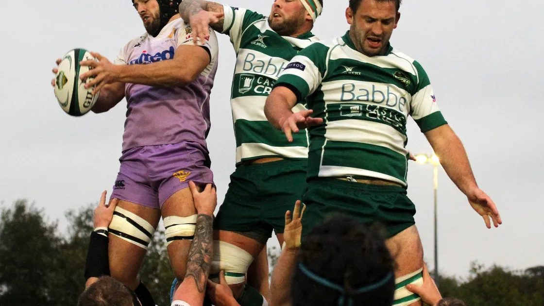 A Footes Lane reunion: Former Raider Dan Hill wins a line-out for Clifton on Saturday under pressure from Guernsey captain Lewis Hillier.  (Picture by Mike Marshall, 22738588)