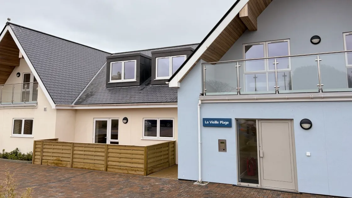 The flats at Sandy Hook, in St Sampson’s, have been beset with delays, having originally been due for completion last summer.