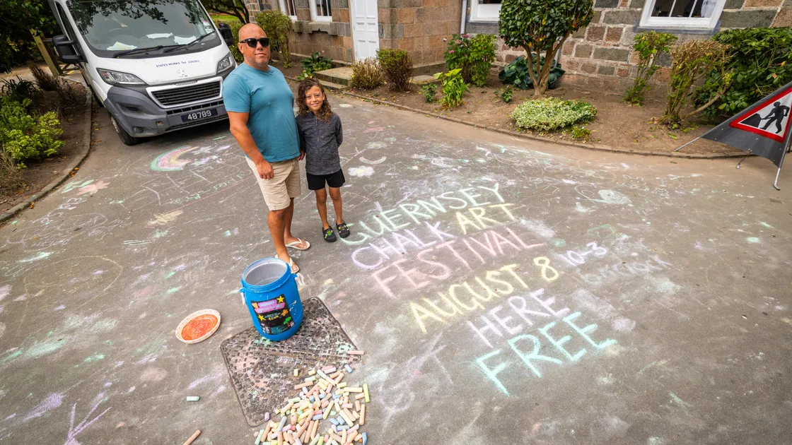 Ross Le Brun is holding his annual Chalk Art Festival at Saumarez Park this weekend for the fourth year running. It is a completely free event for children and adults to take part and release their creativity. Mr Le Brun is pictured with his son Otis, 9. (Picture by Sophie Rabey, 34870901)