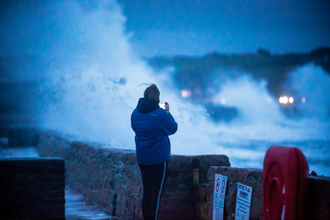 Storm watching at Vazon Bay. High tide and strong winds combined to cause minor flooding on the west coast yesterday. (Picture by Peter Frankland, 26489367)