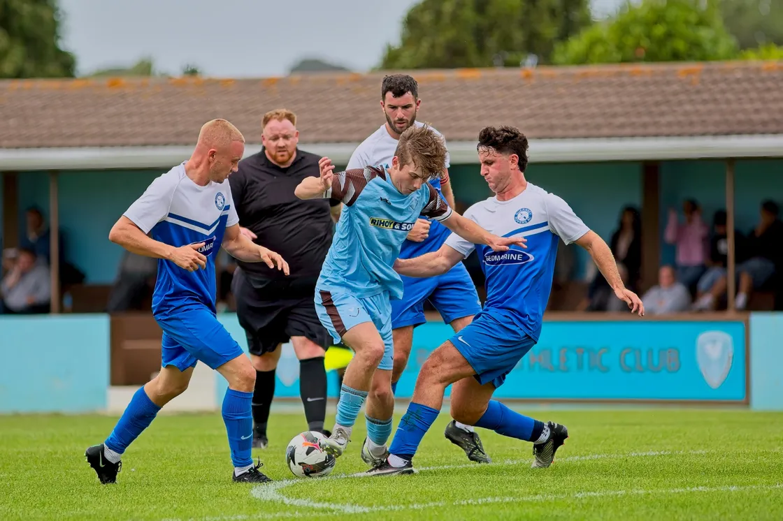 Mason Prigent is crowded out by the Rovers defence.