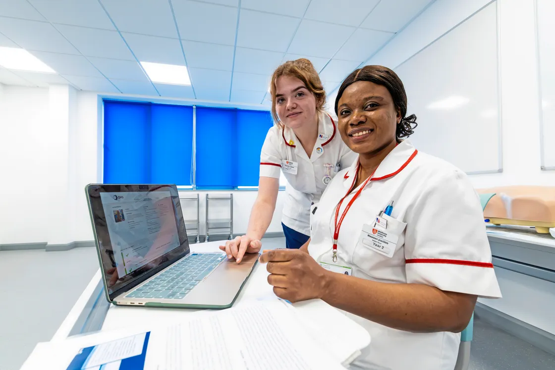 Charlotte Fallaize, left, and Maureen Joachim, nursing students using AI