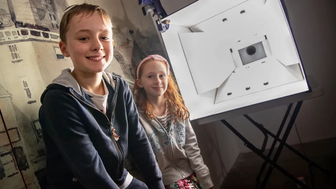 Rory, 10, and Esther Tolcher, 7, at the Guernsey Museums Creative Castle event at Castle Cornet. They enjoyed trying out the camera obscura that had been set up in the clock tower. (Pictures by Andrew Le Poidevin, 29907416/8)