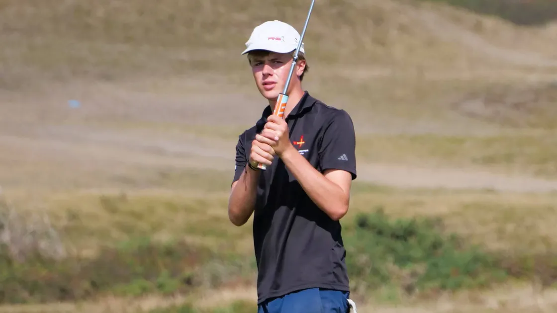 Harry Ingrouille watches his approach putt climb the step in the middle of the 13th green. He shot a 70 gross to take the scratch prize.