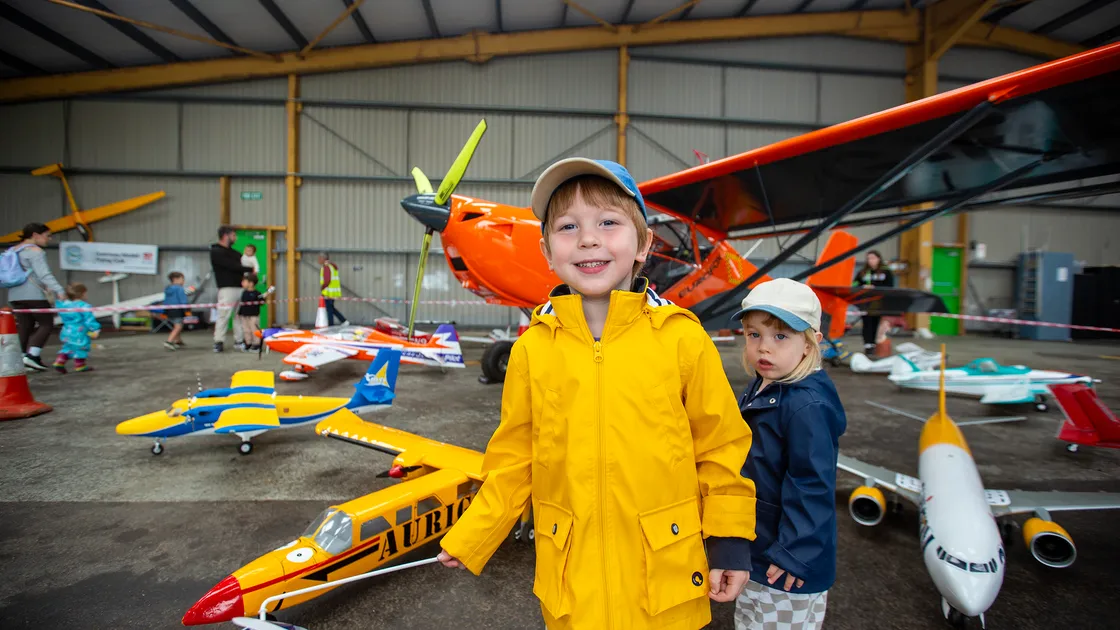 Felix and Casper Barlow get close to some of the model aircraft at the event. (33559700)