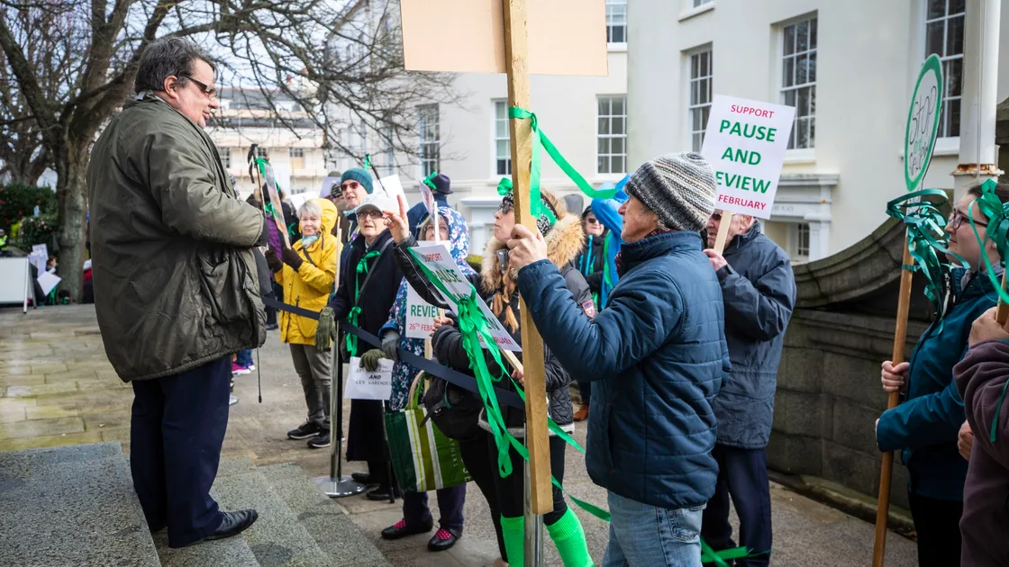 Picture by Sophie Rabey.  26-02-20.  People of Guernsey have gathered in protest this morning outside the States building.  A final appeal to deputies to 'Pause and Review' the Secondary School Education plans as requete day is here.  John Gollop.. (27288367)