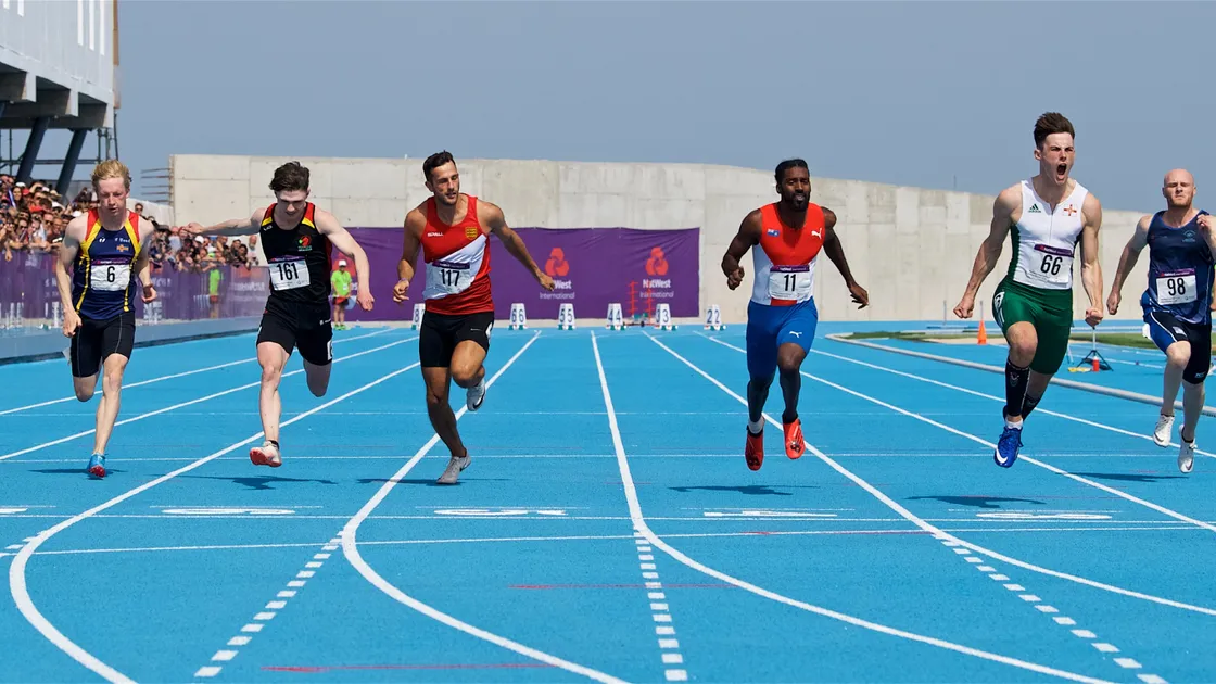 Joe Chadwick roars in celebration as he comes in first to win gold in the men's 100m final at the Gibraltar 2019 Island Games.
