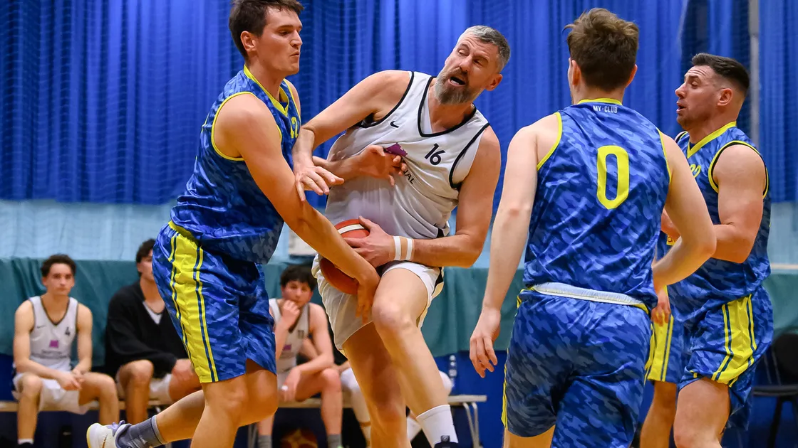 Michael Beausire in the thick of the action as he helped Skipton beat Savills to seal the title on Friday.