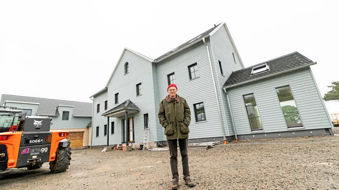 Jon Moulton in front of his new prefabricated seven-bed, four-storey home at Jerbourg. The house was built in sections by a German company and shipped to the island on standard freight sailings. (Picture by Sophie Rabey, 33973198)