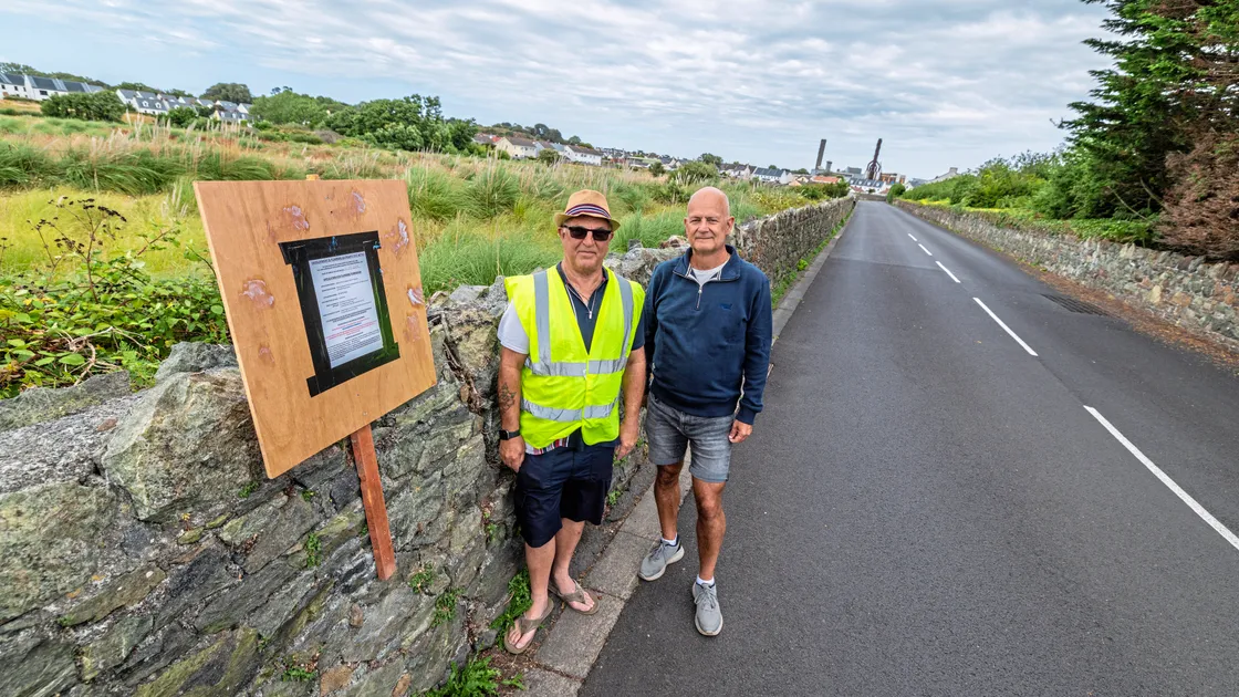 Joe Abbotts, left, and Karl Guille from St Sampson’s Douzaine at the site in the Saltpans where plans are being made to put in two roads to service a new housing development. The parish has organised a meeting for tomorrow to discuss its concerns and options