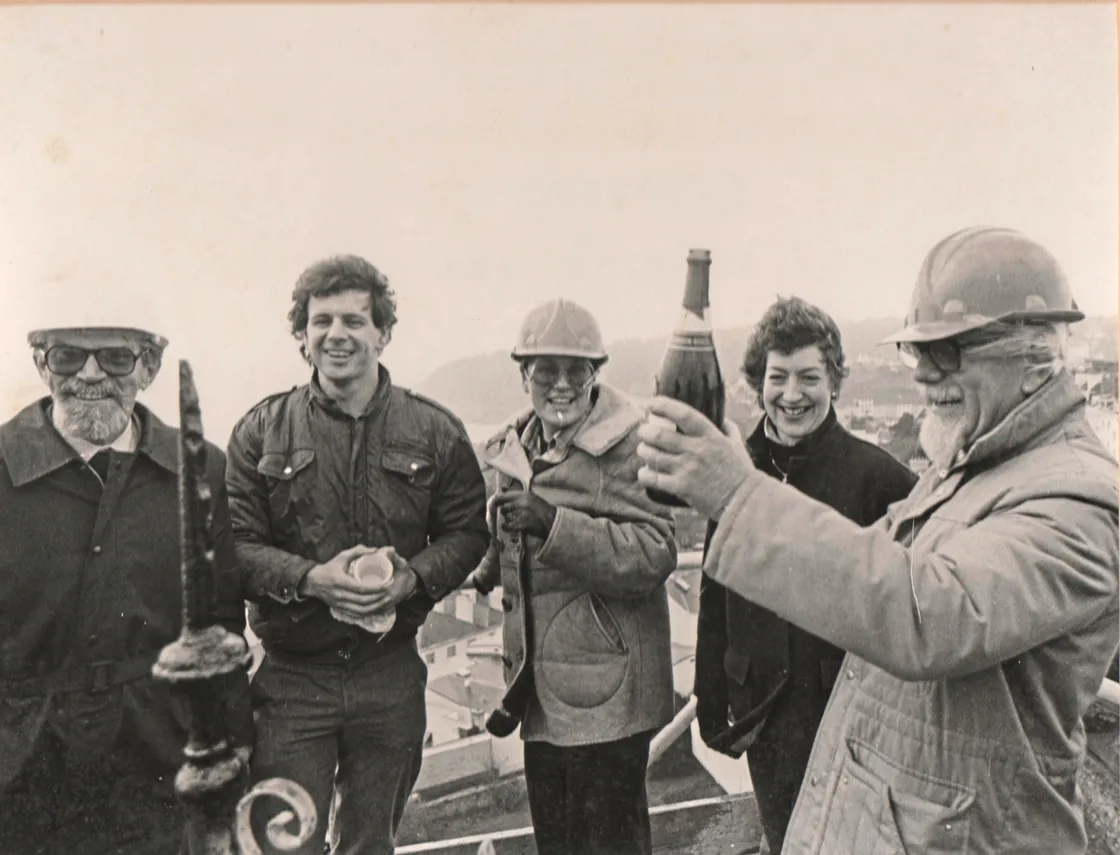The topping out photo from the steeple of St James in 1984. L-R: engineer Eric Lyle, a 24-year-old site manager David Duquemin, IDC president Pat Lihou, St James director Bridget Adams and architect George Bramall. (Picture supplied)