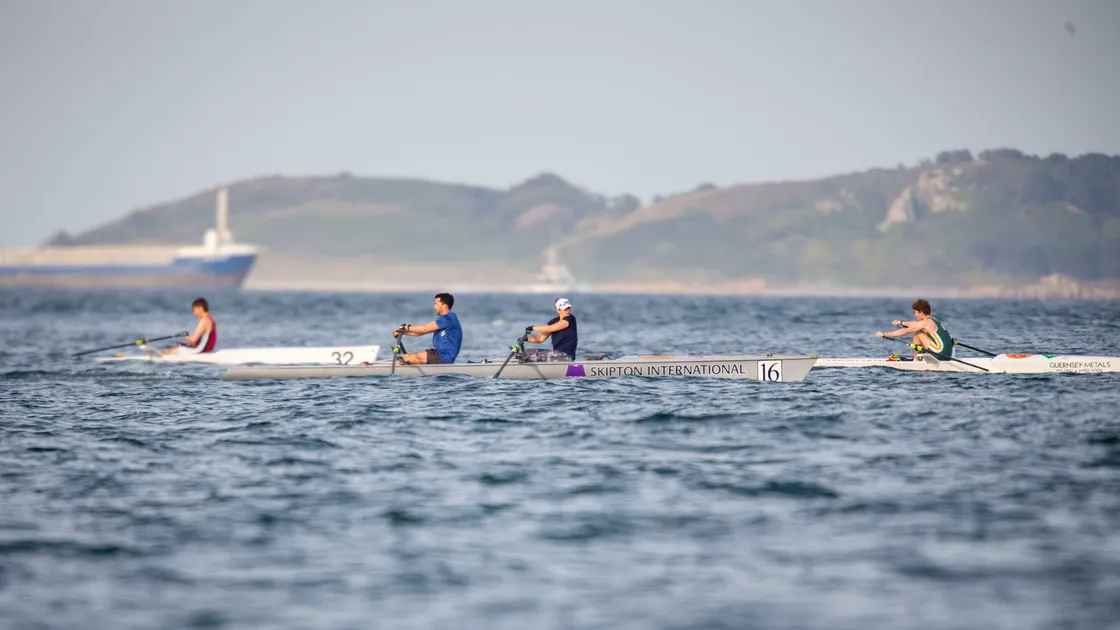 Mixed pairs class winners Marc Isabelle and Dani Barnett pictured among singles rowers Paul Pearce (No. 32) and James Plumley. (Picture by Luke Le Prevost, 30773081)