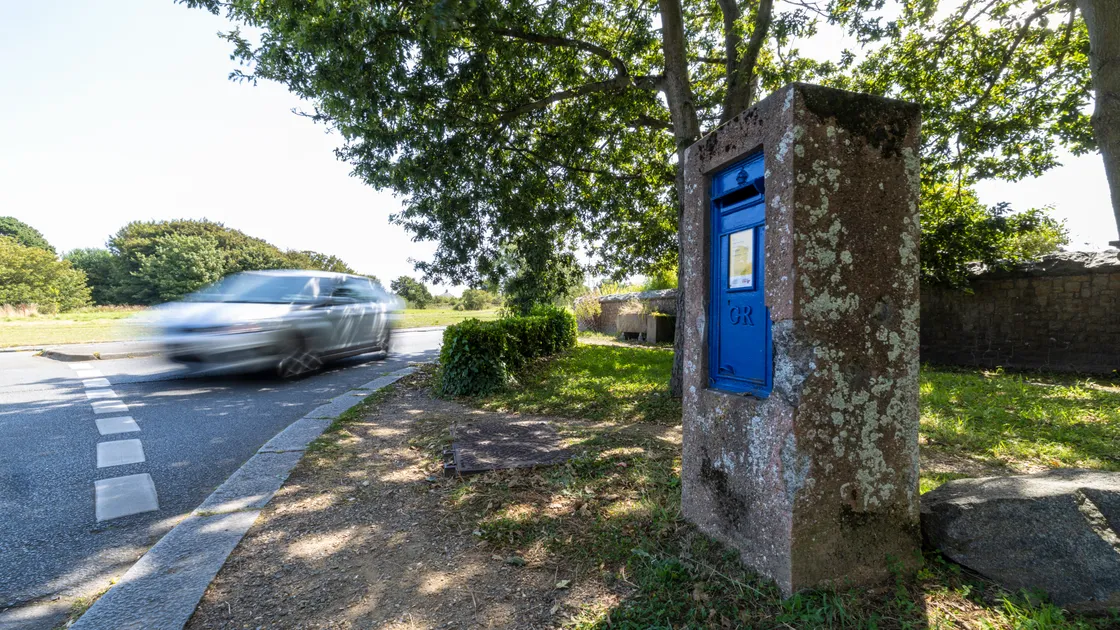 Box 89 at the end of Fort Road, St Peter Port, is a George V post box dated from 1934 which was damaged during an RAF raid on Fort George in June 1944, and the impact damage remains visible. (Picture by Peter Frankland, 34767502)