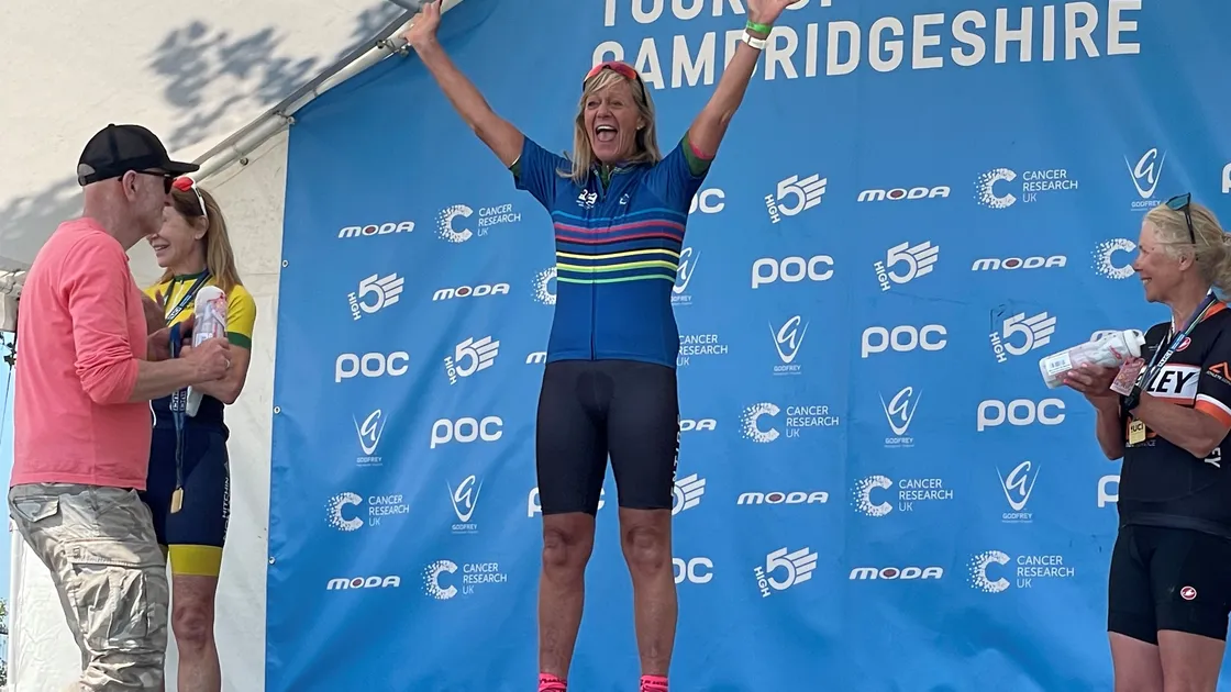 Andrea Nightingale atop of the podium after winning the women’s aged 60-64 road race. (32189373)