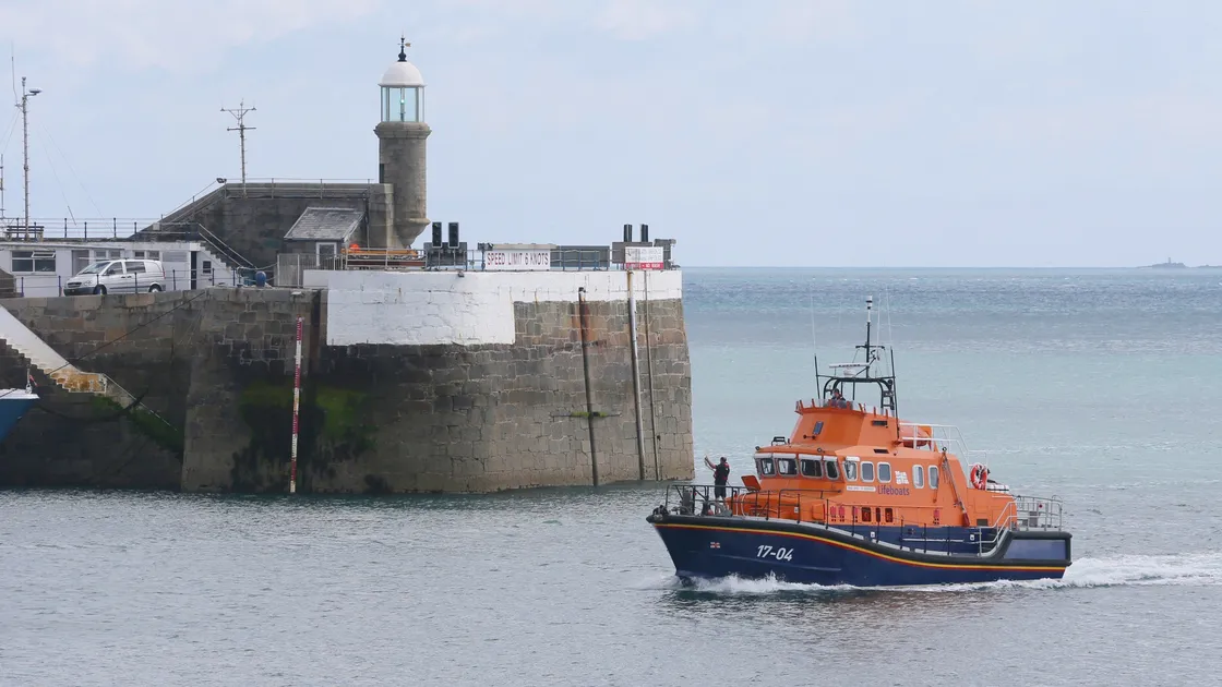 Pic by Adrian Miller 02-07-20 St Peter Port Harbour. Lifeboat RNLB Spirit of Guernsey returns from the Isle of White after being repaired.. (28426543)