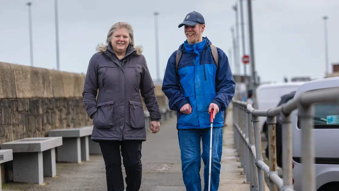 Corinne Connolly organised a fundraiser to raise money for Guide Dogs Guernsey. She is pictured with Simon De La Mare, who lost his guide dog, Cyril in December
