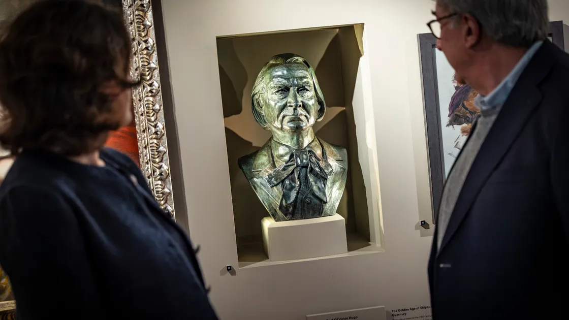 Larry Malcic and Helen Glencross unveiling the Victor Hugo bust created by Nicole Farhi at Candie Museum this week. It will be on display until its permanent home is created at the proposed new Victor Hugo Centre.						 (Picture by Peter Frankland, 34645031)
