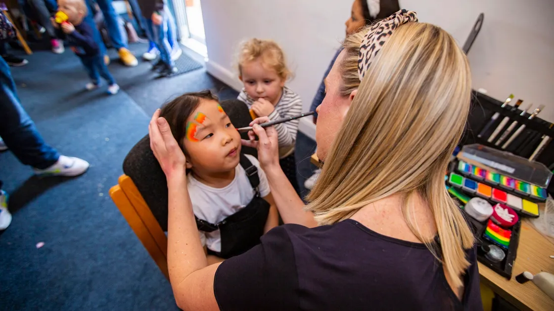 Deedee Dai (4) getting her face painted at the Bailiwick children's party. (Picture by Sophie Rabey, 29505281)
