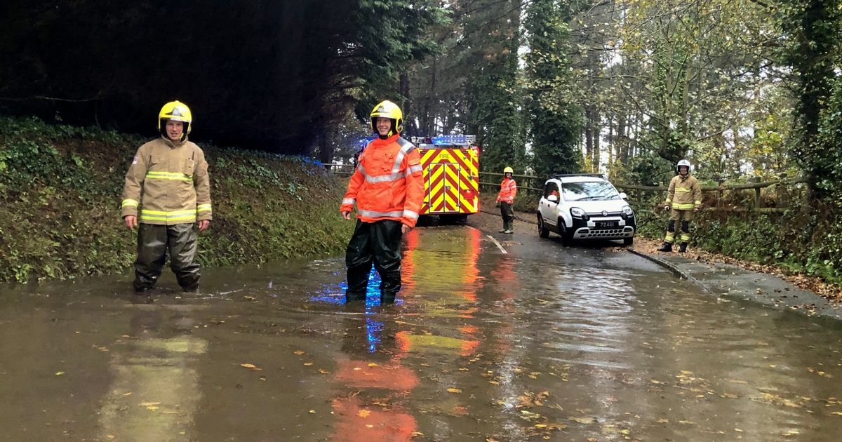 Car stranded as week’s rain falls in just 12 hours