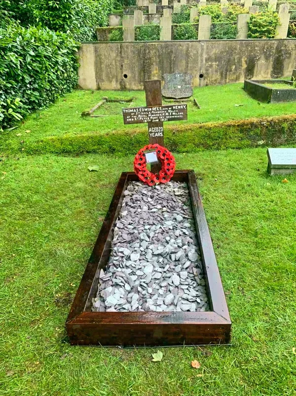 The inscription on the cross has been repainted and the grave marked with blue slate. A poppy wreath was laid during Saturday’s ceremony.
