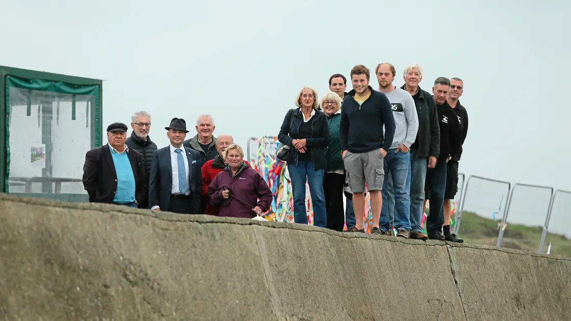 Members of the public and politicians at the eastern end of L’Ancresse where a public protest is due to take place on Sunday 15 October in a bid to convince planning authorities to stop the wall and kiosk from being demolished.(Picture by Adrian Miller, 19494795)