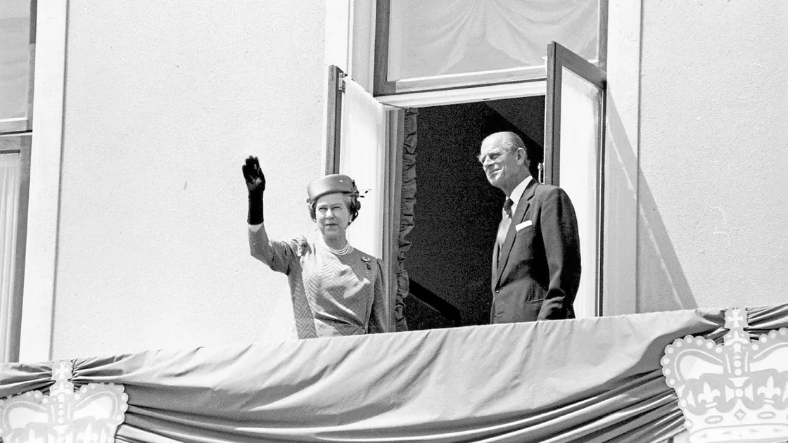 Her Majesty The Queen and His Royal Highness The Prince Philip, Duke of Edinburgh on the balcony of The Royal Hotel, St Peter Port, in 1989. (29421372)