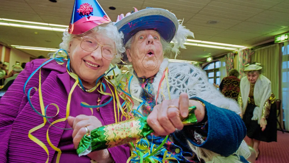 A Millennium Party for old age pensioners in January 2000 works like a dream as Chris encouraged these two centenarians – Mabel De La Mare (left) and Victoria Langlois – to ham it up a little. Charm is an essential and underrated skill for a Press photographer