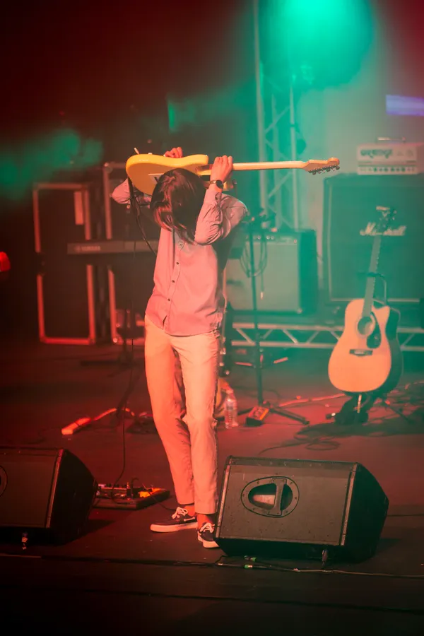 Just Smile's guitarist wowed the audience by playing behind his head. (Picture by Sophie Rabey, 29554607)