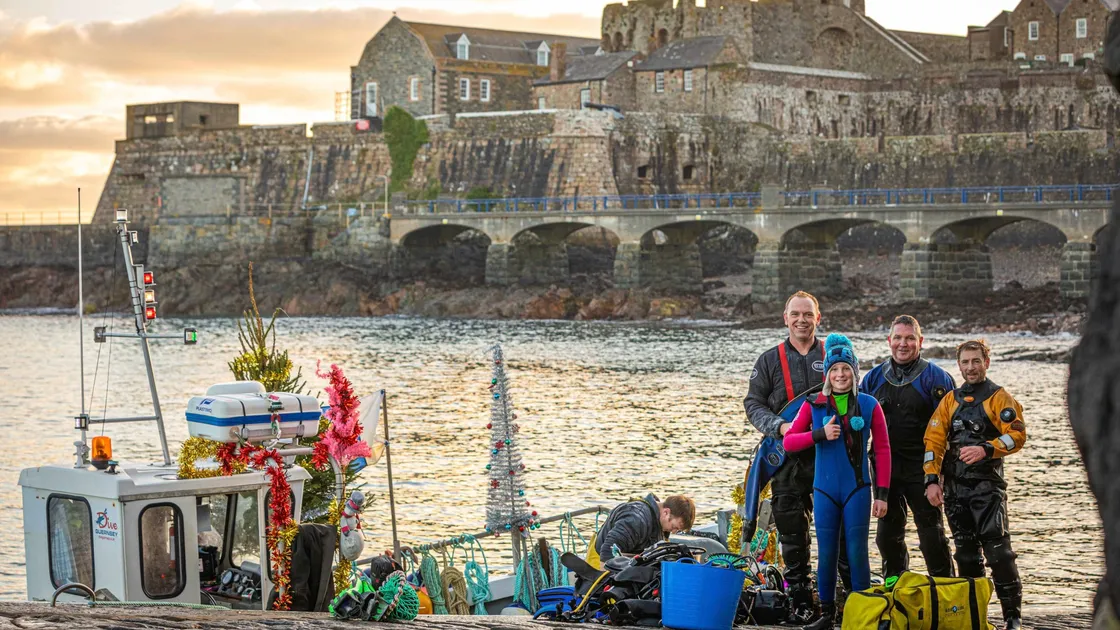 Christmas Day divers, left to right, Jim Martin, Braden Morris, 12, Trevor Morris and Sean Murphy. (Pictures by Ben Fiore, 26758580)