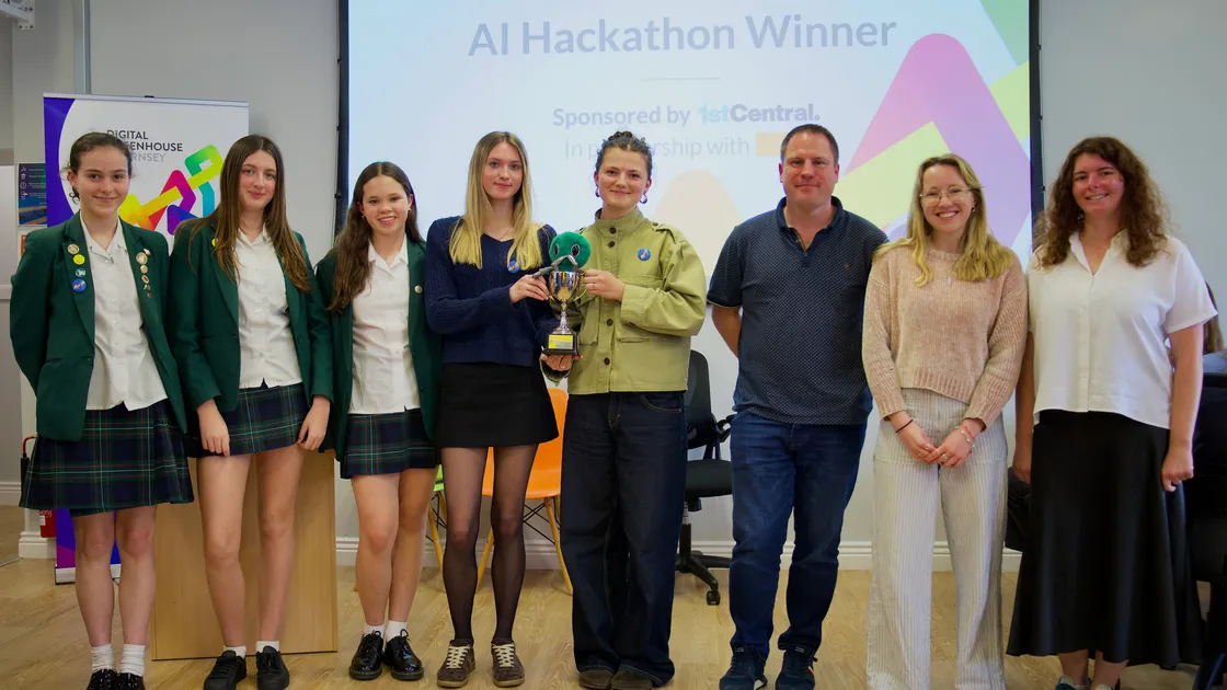 The winning team from The Ladies’ College alongside Paul Torode from 1st Central, Estelle Moseley from the Digital Greenhouse and Katie Inder from the Innovate Guernsey Board.