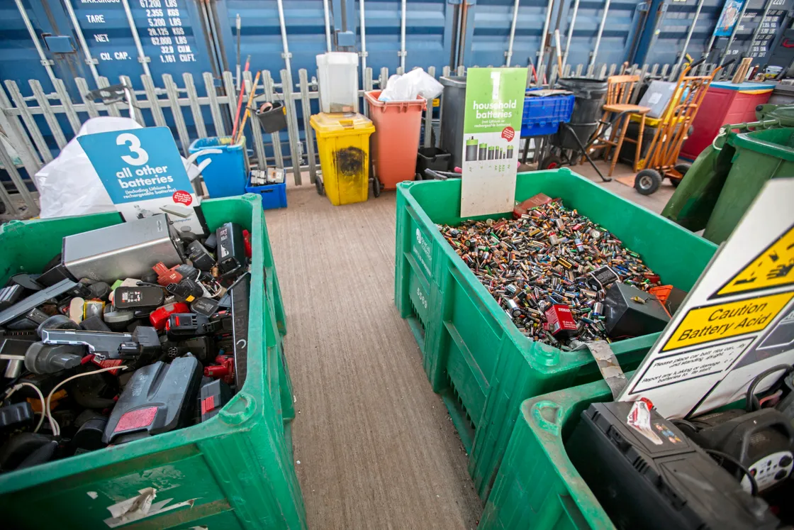  Batteries are sorted into different boxes at the household waste and recycling centre. (30746282)
