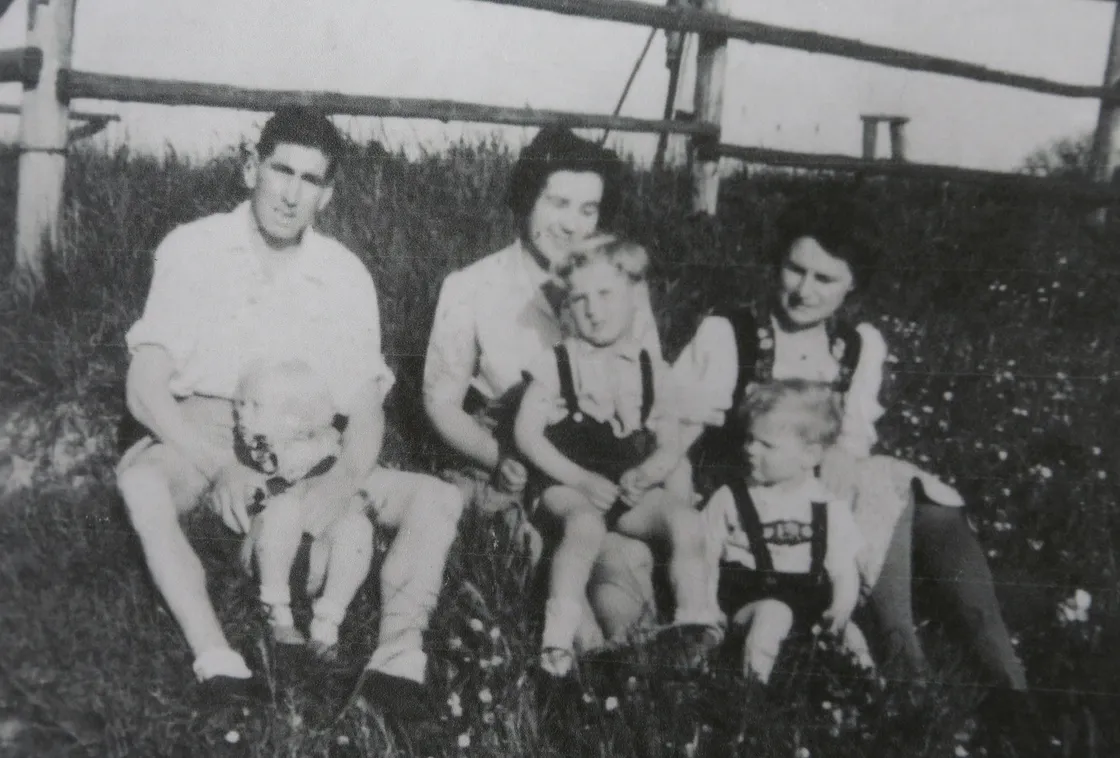 A picture taken in the Biberach just after it was liberated. Left to right, Sidney Skillett, holding their son David, Gladys Skillett, holding their son Colin, and family friend Maria Koch with her son Heiner.