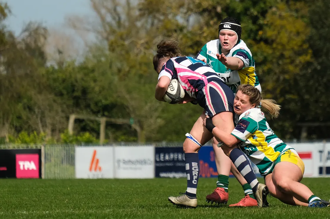 The East Grinstead ball-carrier is wrapped up by two GRL tacklers.