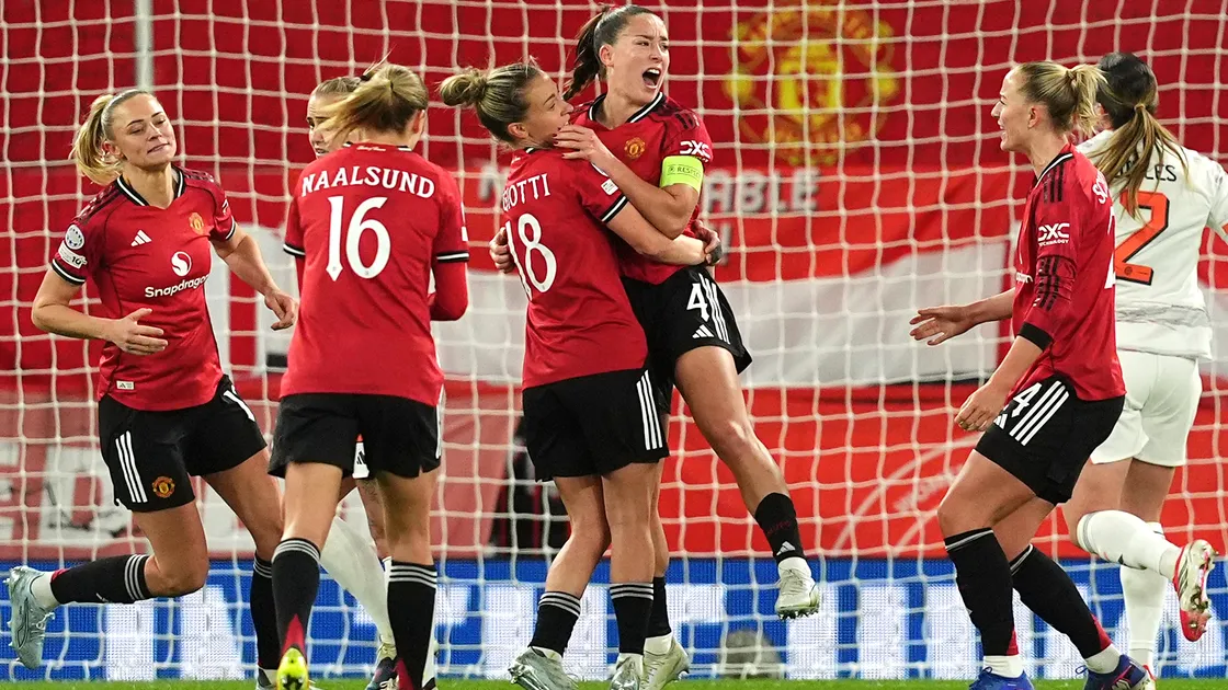 Maya Le Tissier (centre) celebrates scoring Manchester United's first goal against Bayern Munich from the penalty spot at Old Trafford.
