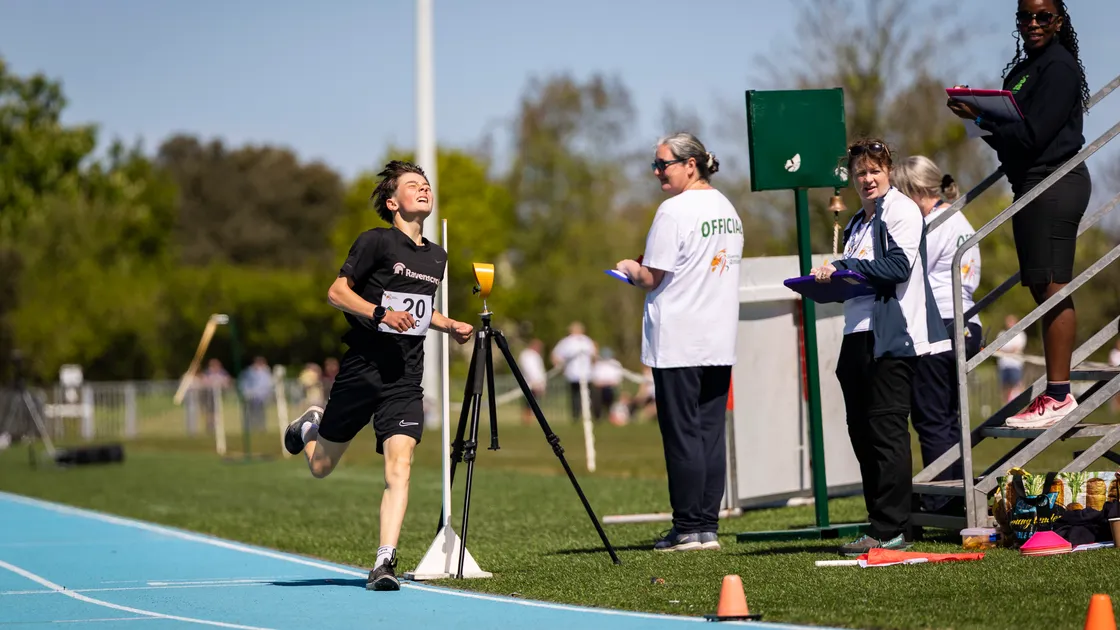 13-year-old Paul Friedrich crosses the line to win the 1,500m in an English Schools qualifying time.