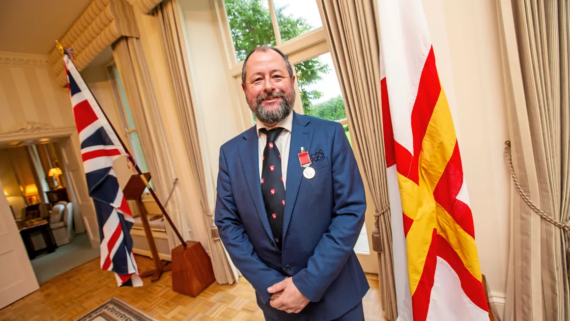Jo Reeve, director of international relations & constitutional affairs at the States, received his British Empire Medal for services to government at Government House. (Picture by Sophie Rabey, 33810742)