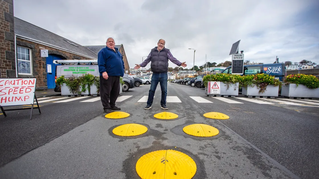 Nick Olliver, left, and Monty Waterman examine new speed humps outside the White Rock Cafe. (Picture by Peter Frankland, 28942082)