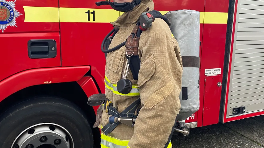 Tyler Thorne in full firefighting uniform provided by the Guernsey Fire & Rescue Service. Image provided by Tyler Thorne.  (27167024)Image taken by the Guernsey Fire & Rescue Service Media Liaison. 