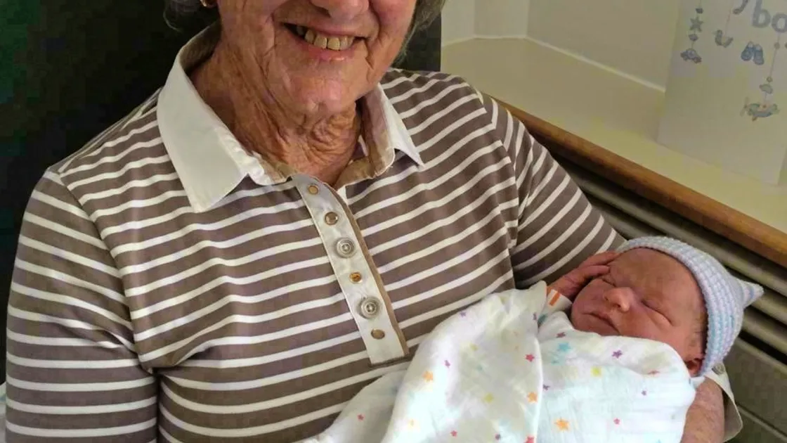 Pat Henry, with one of he great-grandchildren, has had her plans for a big 90th birthday party put on hold by the lockdown.