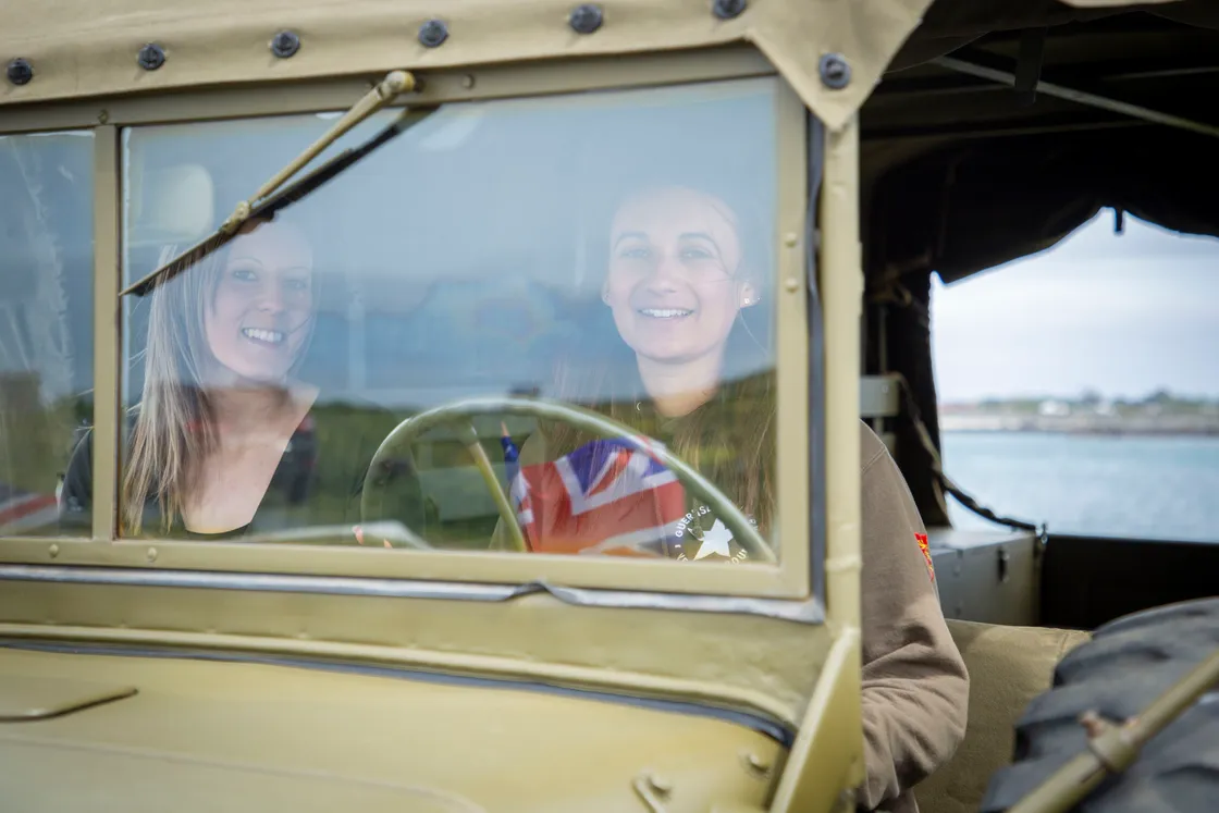 Picture by Sophie Rabey.  04-05-20.  Guernsey Military Vehicle Group have had to change their plans that they had in place for the 75th Liberation Day here this year because of Coronavirus Lockdown.  Instead of the usual cavalcade they will be posting videos on their social media throughout the day to show islanders some of their members military vehicles.  Dyer family, L-R Sophie and Laura Dyer.. (28240582)