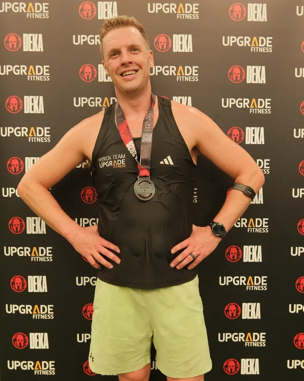 James Travers standing proud with his medal after clocking the fastest men’s singles time.