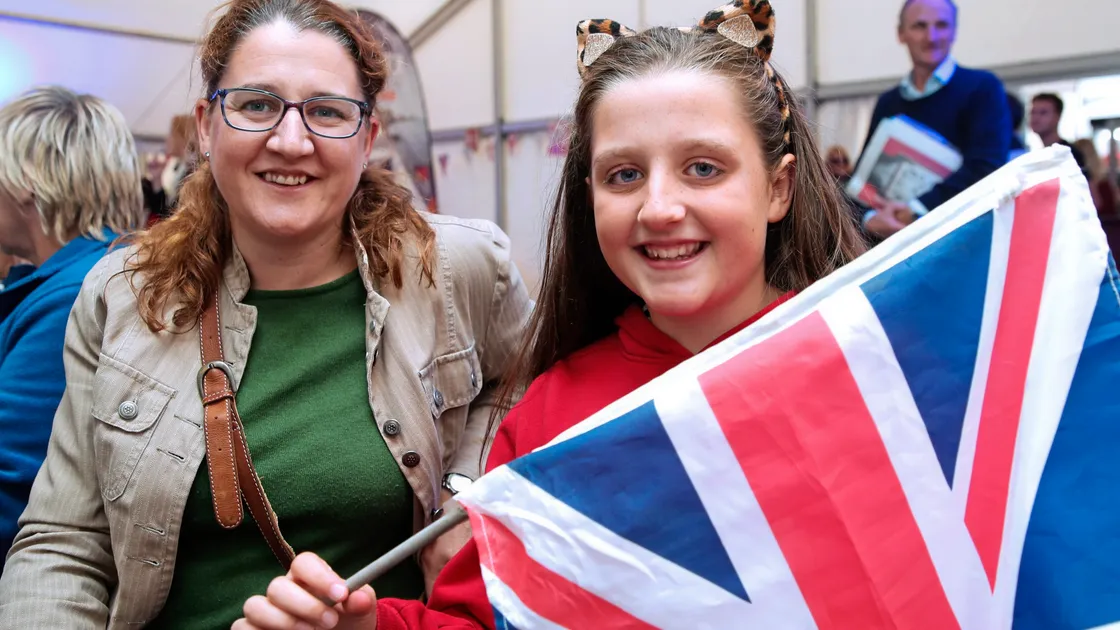 Proms in the Square at Market Square. The event had to be relocated from Albert Pier due to the adverse weather conditions. Right: Sarah Barrett with her daughter Jorja, 11, enjoying the event. (Picture by Adrian Miller, 19276554)