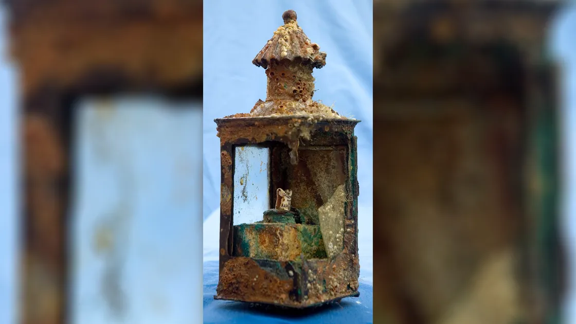 An oil lamp recovered from the wreck and when found still carried the smell of the fuel that once lit it