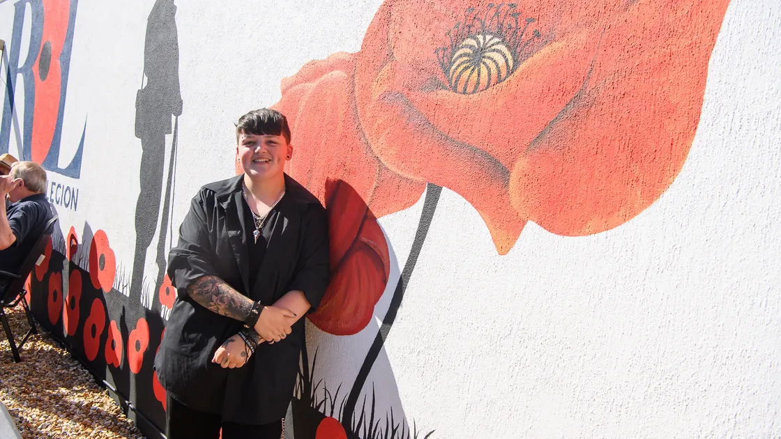 Stevie Austen is the artist responsible for designing and painting a new wall mural just unveiled as part of an outdoor seating area at the L’Islet branch of the Royal British Legion.