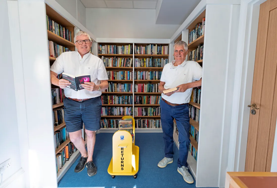 Dave Beausire and Rob Prow in the library which has moved to inside the office